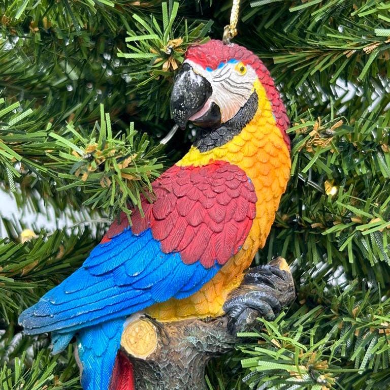 Colorful Macaw on Branch Ornament (blue or red)